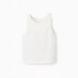 Top acanalado coral para niña, en algodón elástico, con etiqueta interior estampada para mayor comodidad.