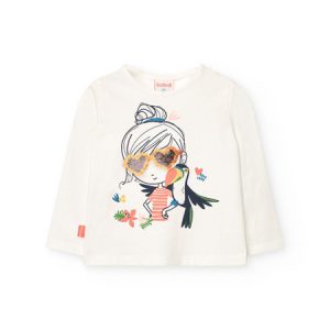 Camiseta de manga larga blanca para niña con estampado de una chica con gafas de sol decoradas con lentejuelas y un tucán.