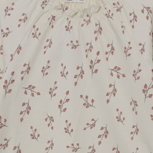 Camiseta niña blanca con estampado de ramitas y volante en el cuello