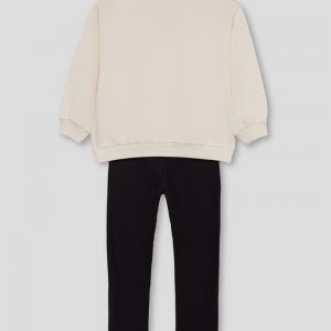 Conjunto niña huellas blanco y negro