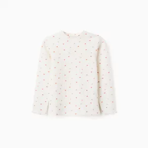 Camiseta niña manga larga blanca con estampado floral y bordes ondulados