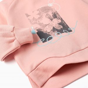 Sudadera perchada niña naranja con estampado frontal y mangas raglán